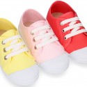 COTTON canvas Kids sneaker shoes with laces closure and toe cap.