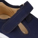 Cotton canvas kids T-Bar sandal shoes with hook and loop strap closure.