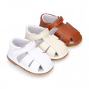 Nappa soft leather sandals for baby boys with hook and loop closure.