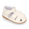 Nappa soft leather sandals for baby boys with hook and loop closure.
