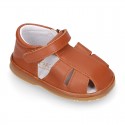 Nappa soft leather sandals for baby boys with hook and loop closure.