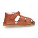 Nappa soft leather sandals for baby boys with hook and loop closure.