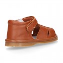 Nappa soft leather sandals for baby boys with hook and loop closure.