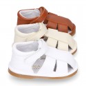 Nappa soft leather sandals for baby boys with hook and loop closure.