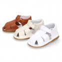 Nappa soft leather sandals for baby boys with hook and loop closure.