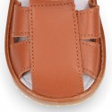 Nappa soft leather sandals for baby boys with hook and loop closure.