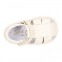 Nappa soft leather sandals for baby boys with hook and loop closure.