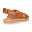 TAN color leather Kids sandal shoes with crossed straps design.