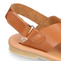 TAN color leather Kids sandal shoes with crossed straps design.