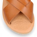 TAN color leather Kids sandal shoes with crossed straps design.