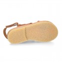 TAN color leather Kids sandal shoes with crossed straps design.