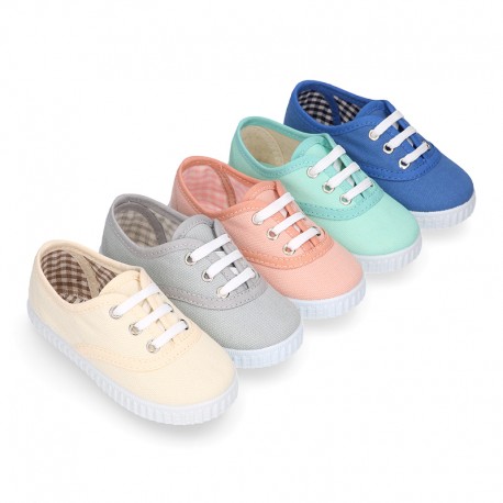 Cotton canvas Kids sneaker shoes BAMBA style with laces closure.