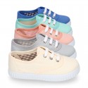 Cotton canvas Kids sneaker shoes BAMBA style with laces closure.