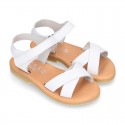 Nappa leather Crossed straps Girl sandal shoes with hook and loop closure.