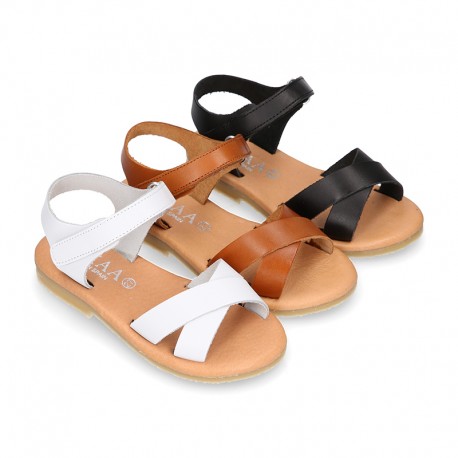 Nappa leather Crossed straps Girl sandal shoes with hook and loop closure.