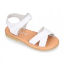 Nappa leather Crossed straps Girl sandal shoes with hook and loop closure.