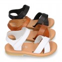 Nappa leather Crossed straps Girl sandal shoes with hook and loop closure.