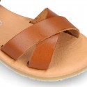 Nappa leather Crossed straps Girl sandal shoes with hook and loop closure.