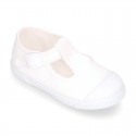 Cotton canvas Kids T-Strap shoes with toe cap.