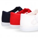 Cotton canvas Kids T-Strap shoes with toe cap.