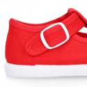 Cotton canvas Kids T-Strap shoes with toe cap.