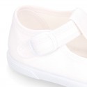 Cotton canvas Kids T-Strap shoes with toe cap.