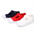 Cotton canvas Kids T-Strap shoes with toe cap.