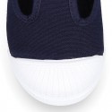 Cotton canvas Kids T-Strap shoes with toe cap.