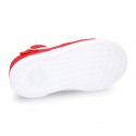 Cotton canvas Kids T-Strap shoes with toe cap.