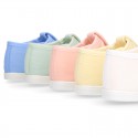 Pastel colors Cotton canvas little T-Strap shoes with hook and loop closure for babies.