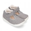 Cotton canvas Kids T-Strap shoes with hook and loop closure, counter and toe cap.