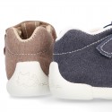 Cotton canvas Kids T-Strap shoes with hook and loop closure, counter and toe cap.