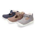 Cotton canvas Kids T-Strap shoes with hook and loop closure, counter and toe cap.