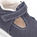 Cotton canvas Kids T-Strap shoes with hook and loop closure, counter and toe cap.