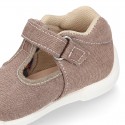 Cotton canvas Kids T-Strap shoes with hook and loop closure, counter and toe cap.