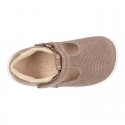 Cotton canvas Kids T-Strap shoes with hook and loop closure, counter and toe cap.