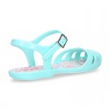 Girl Jelly ballet style shoes with buckle fastening and FLOWERS design for beach and pool use.