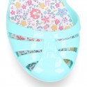 Girl Jelly ballet style shoes with buckle fastening and FLOWERS design for beach and pool use.