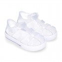 Tennis style kids jelly shoes with button and clip closure for Beach and Pool.