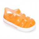 Tennis style kids jelly shoes with button and clip closure for Beach and Pool.