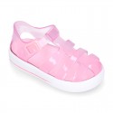 Tennis style kids jelly shoes with button and clip closure for Beach and Pool.