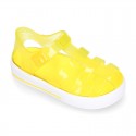 Tennis style kids jelly shoes with button and clip closure for Beach and Pool.