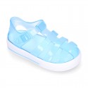 Tennis style kids jelly shoes with button and clip closure for Beach and Pool.