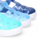 Tennis style kids jelly shoes with button and clip closure for Beach and Pool.