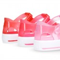 Tennis style kids jelly shoes with button and clip closure for Beach and Pool.