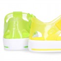 Tennis style kids jelly shoes with button and clip closure for Beach and Pool.