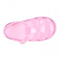 Tennis style kids jelly shoes with button and clip closure for Beach and Pool.