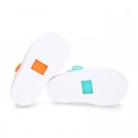 Tennis style kids jelly shoes with button and clip closure for Beach and Pool.