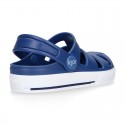 Kids jelly shoes with OLA CLOG design for beach and pool use.