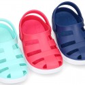 Kids jelly shoes with OLA CLOG design for beach and pool use.